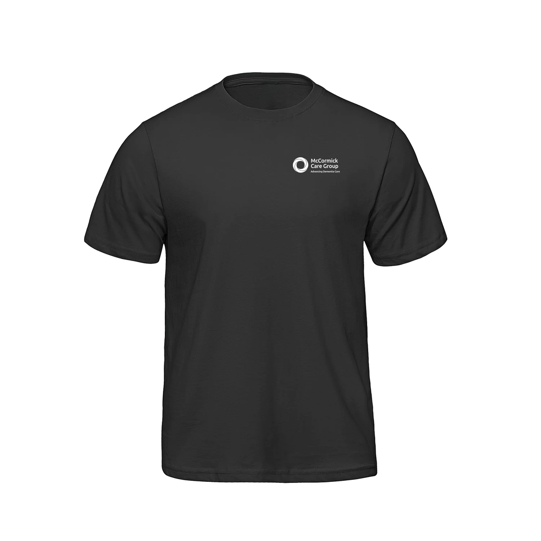 MCCORMICK CARE GROUP MONOCHROMATIC EMBLEM TEE (MENS)