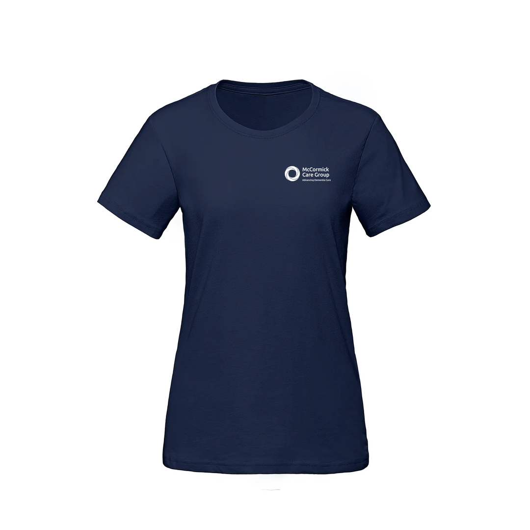 MCCORMICK CARE GROUP MONOCHROMATIC EMBLEM TEE (WOMENS)